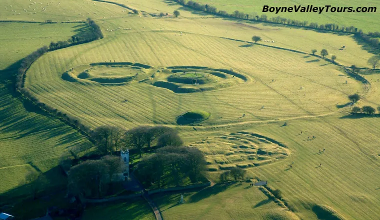 Aerial view of the Hill of Tara with Forradh earthworks, Mound of the Hostages and St Patrick's Church among green fields