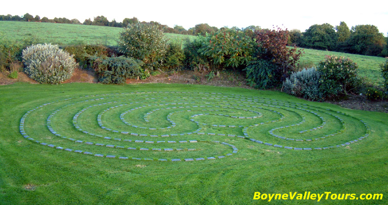 Labyrinth with paving stones laid on the grass