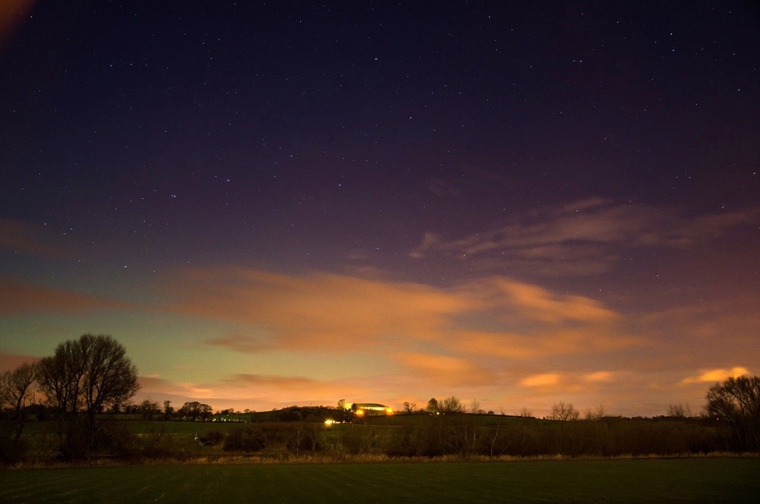 Aurora Borealis which illuminated the skies behind Newgrange