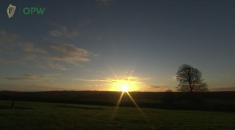 Rising sun viewed from the Newgrange monument.